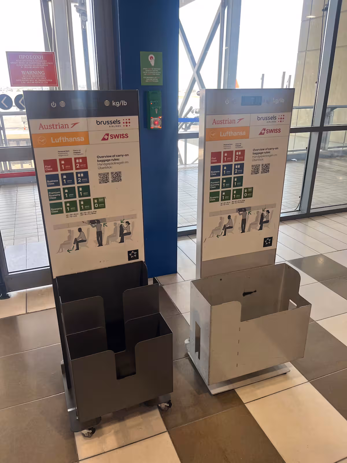 Two inconsistent baggage sizers for Austrian, Brussels Airlines, Lufthansa, and SWISS at Thessaloniki Airport.