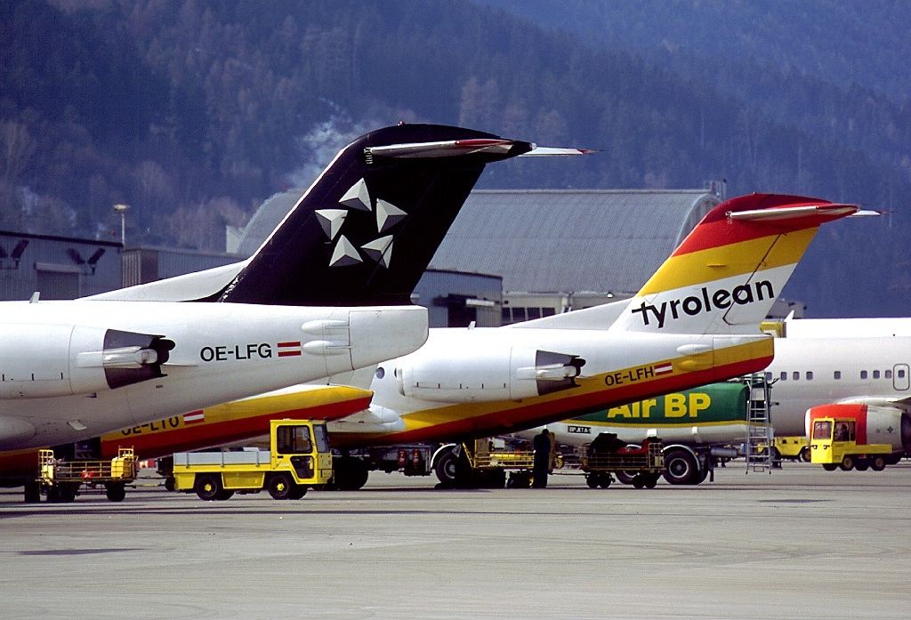 Tyrolean Airways and Austrian Airlines aircraft tails on the tarmac