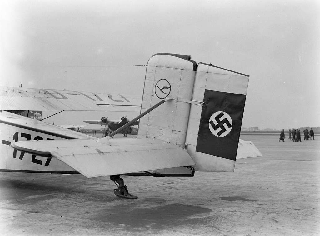 Adolf Hitler's Deutsche Luft Hansa, a Rohrbach Roland II D-1727 "FREIENFELS" trimotor, seen standing on the tarmac at Schiphol Airport with its swastika on its tailfin